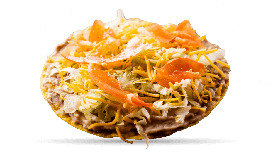 Close up of a tostada, topped with beans, lettuce, cheese and tomatoes.